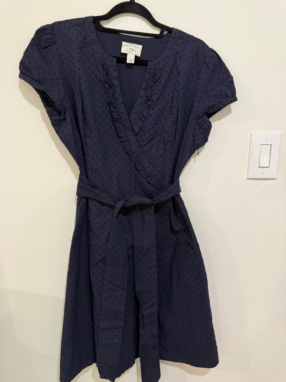 Swiss Dotted, 100% Cotton, Faux Wrap Dress with ruffle. Side zip.